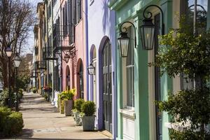 Colorful houses in a row on a street photo