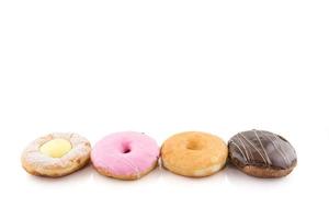 Cream chocolate and strewberry donut, close up isolated on white photo