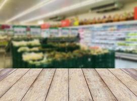 Shelf with fruits in supermarket photo