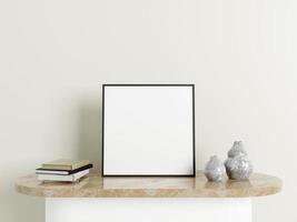 Minimalist square black poster or photo frame mockup on the marble table with decoration