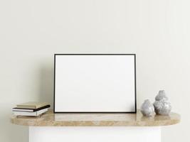 Minimalist horizontal black poster or photo frame mockup on the marble table with decoration