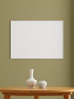 Minimalist horizontal white poster or photo frame mockup on the wall in the living room. 3d rendering.
