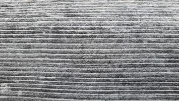 la textura del viejo tablero. tipo de madera bajo la influencia de la precipitación atmosférica. foto