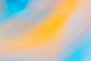 Yellow orange blue abstract banner background with slight blur of curves and waves. photo