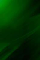 Vertical green background with smooth gradient and wave lines. Backdrop photo