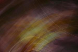 Abstract burgundy yellow background banner with linear waves and glare. photo