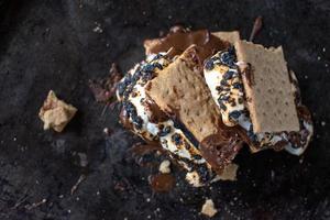 melted messy s'mores stack with toasted marshmallows photo