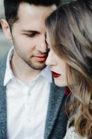 Beautiful wedding couple outside the castle on the stairs photo