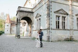 wedding beautiful couple in the evening in a castle photo