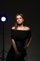 Studio waist up portrait of a beautiful businesswoman photo