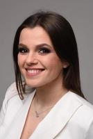 Studio waist up portrait of a beautiful businesswoman photo