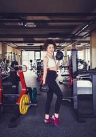 woman with dumbbell photo