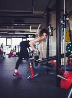 woman in legging doing exercising photo