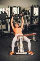 athlete woman doing exercises photo