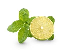 Fresh lime sliced with mint leaf isolated on white background photo
