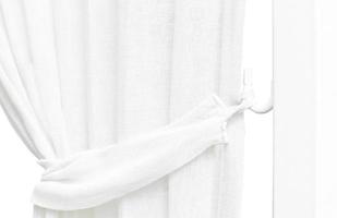 Beautiful linen curtain with a catch Isolated white background. photo