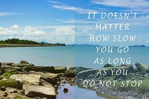 Motivational and inspirational quote on blurred background of blue ocean photo