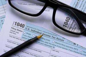 Tax forms 1040. U.S Individual Income Tax Return. Business and tax concept. photo