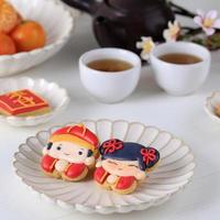 Chinese New Year Imlek Icing Sugar Cookies Character. photo