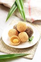 Onde onde, Indonesian Traditional Snack Made from Sticky Rice Flor Stuffed with Mung Bean Paste and Garnish with Sesame Seed. photo