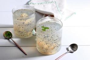 Bird Nest ICe Dessert, Es Sarang Burung. Sweet Soup Made from Shredded Jelly, Lychee, Basil Seeds Selasih, and Sugar Syrup photo