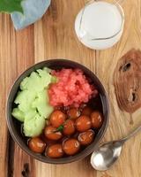 Bubur Campur Madura or Maduranese Mix Porridge, with Various Ingredient. photo