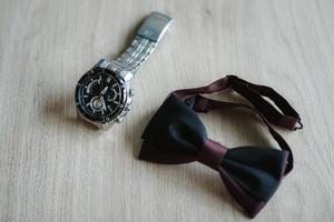 wedding ring in a box and watch the groom photo