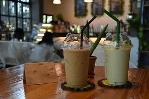 Cups of cafe and drinks in coffee shop photo