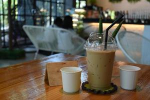 Cups of cafe and drinks in coffee shop photo