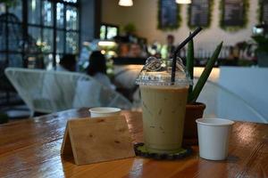 Cups of cafe and drinks in coffee shop photo