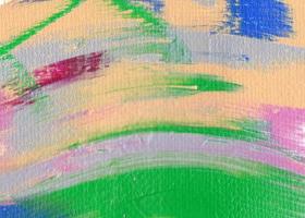 Artist's palette with mixed oil paints, macro, colorful stroke texture on canvas, abstract art background photo