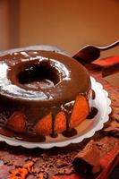 Carrot cake with chocolate icing photo