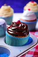 Cupcake close-up with chocolate photo