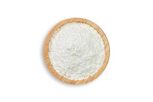 Clipping path. Top view of Circle wood bowl with wheat flour isolated on white background view. Ingredient is food. Close up. Flat lay. photo