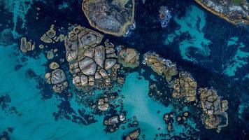 Aerial footage of granite boulders at Green Pools of William Bay National Park WA photo