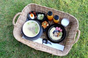 Breakfast in basket in the garden photo