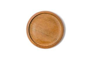 Close up of teak wood drink coaster isolated on white backgroung.Clipping path included.Top view. photo