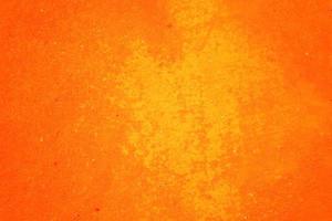 Orange abstract background texture. Blank for design, dark orange edges photo