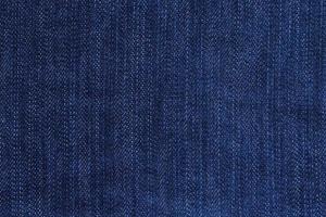 Texture fabric blue jeans background photo