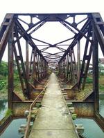 old bridge, former railroad tracks that are no longer functioning photo