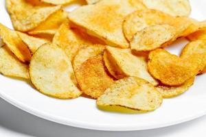Potato chips on a white plate