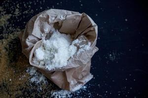 Flour in brown craft paper bag