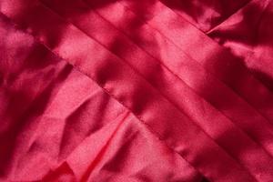 red fabric texture background photo