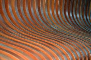 Texture of curved lacquered wooden planks. Abstract background. photo