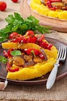 Polenta with vegetables - corn grits pizza with tomato and eggplant photo