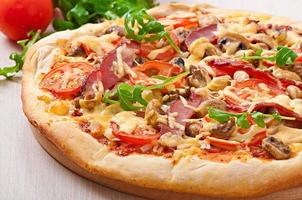 Tasty pizza with cheese photo