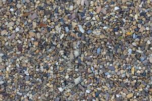 Pebble river gravels seamless texture pattern floor nature stone background photo