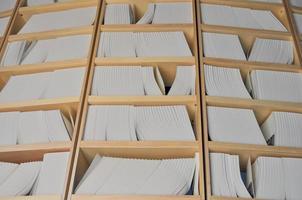 Coloured file folders in office cabinet photo