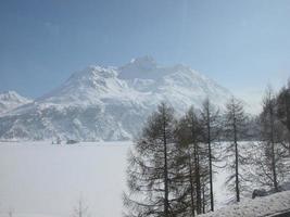 Piz Bernina range of mountains in Swiss Rethic Alps in Canton Gr photo