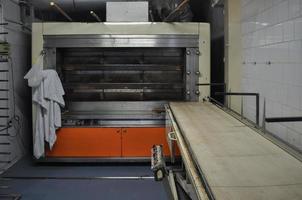 bread and pizza oven in bakery photo